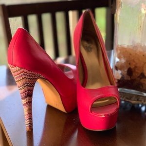 Pink open toed pumps